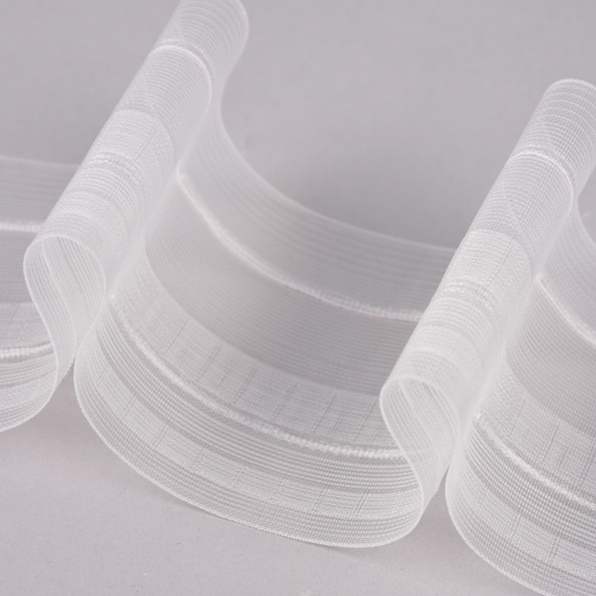 Textile Innovation beginnt mit funktionalem Vorhangband für Profis