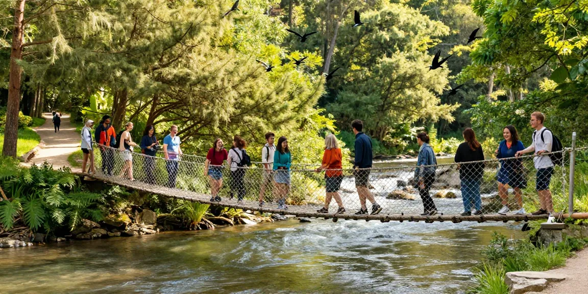 Friends joyfully crossing a river rope bridge, enjoying the scenic outdoor adventure.